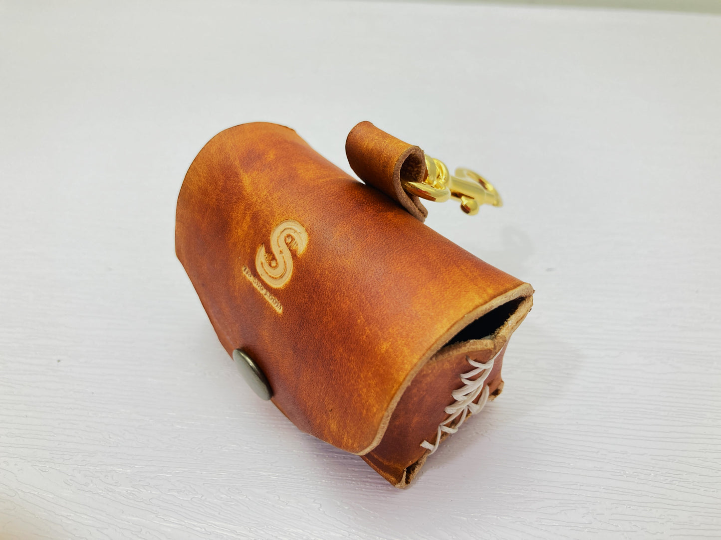 Hand dyed leather poo bag dispenser