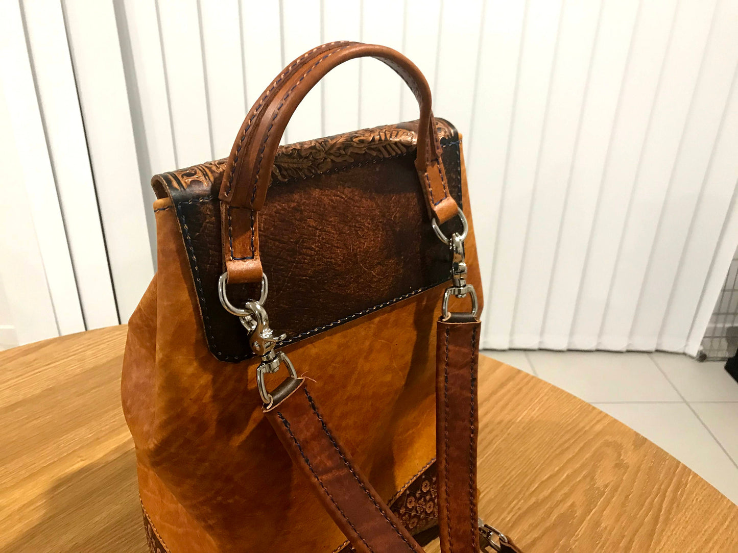 Hand embossed full leather backpack