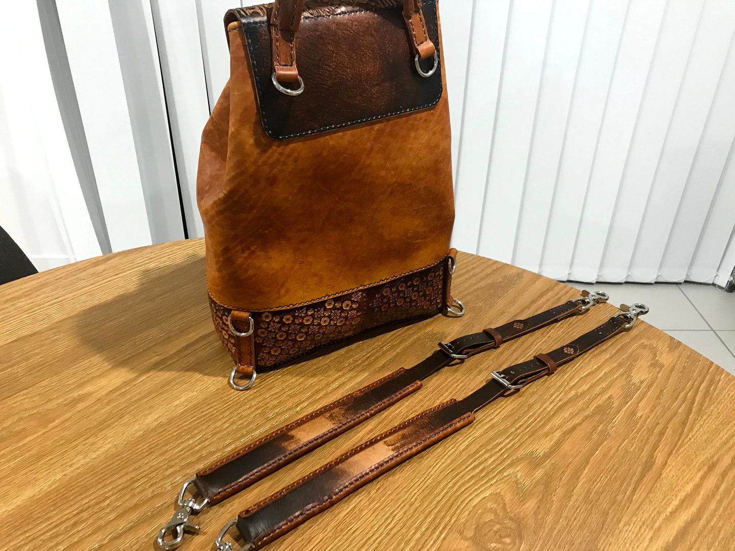 Hand embossed full leather backpack