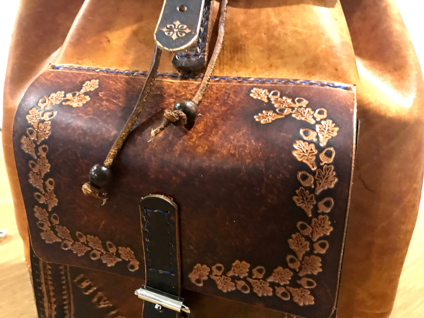 Hand embossed full leather backpack