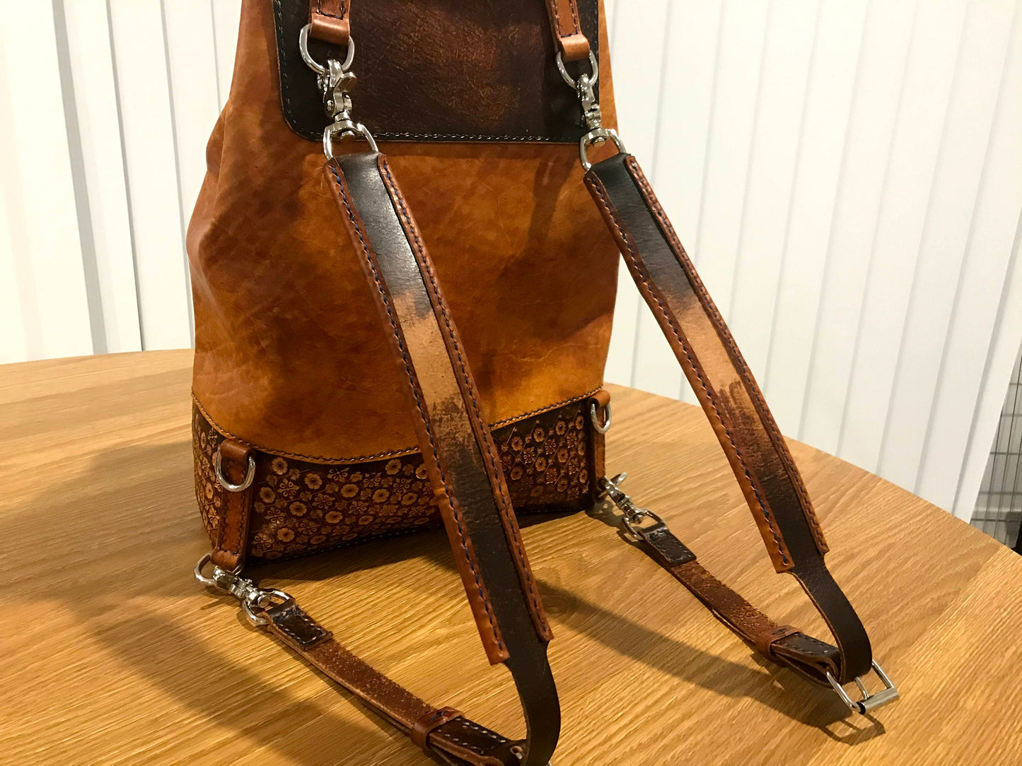 Hand embossed full leather backpack