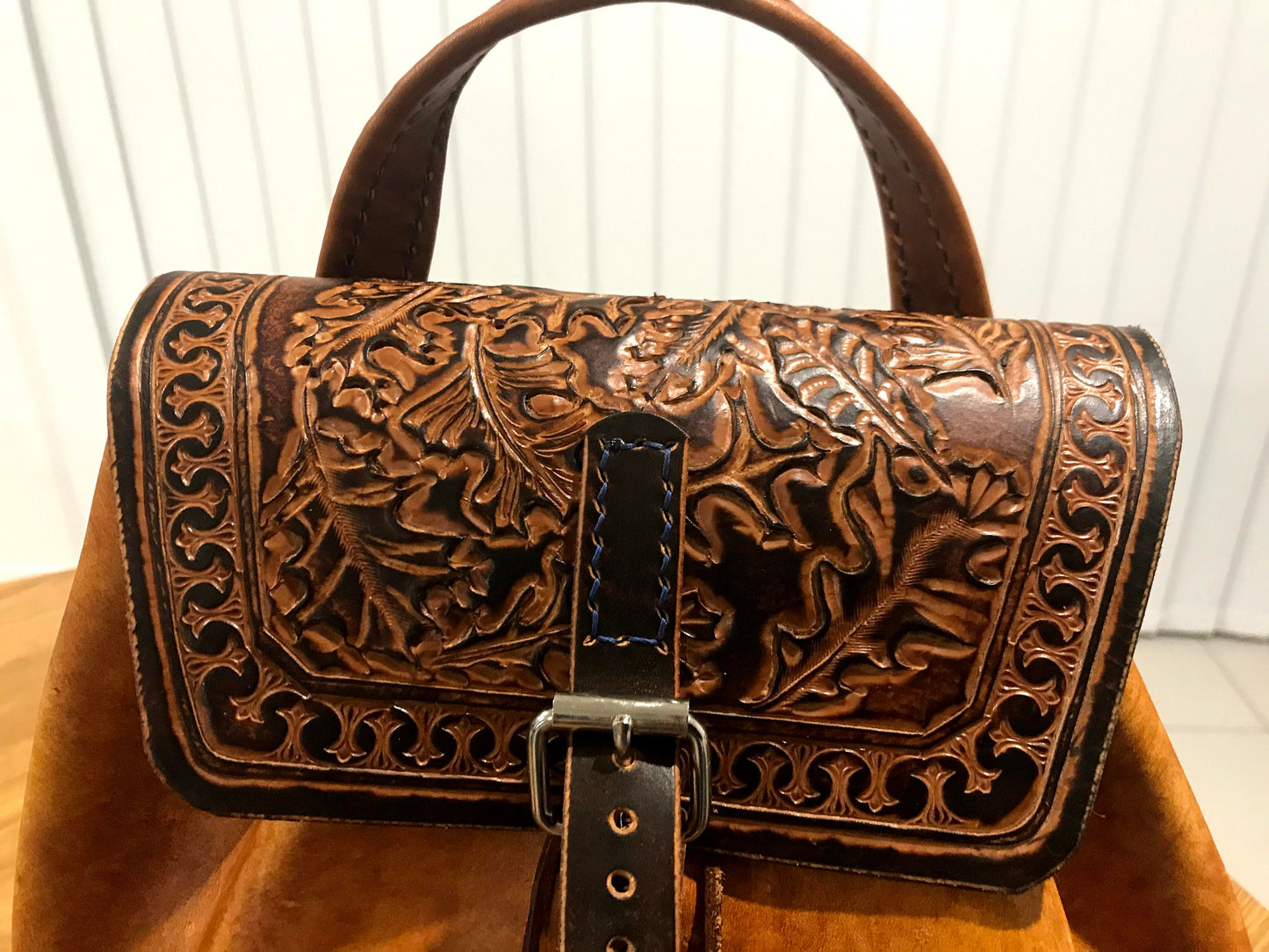Hand embossed full leather backpack
