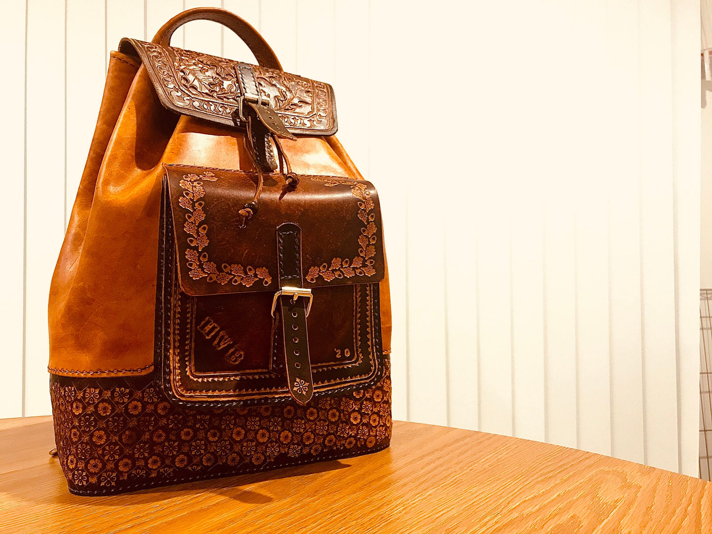 Hand embossed full leather backpack