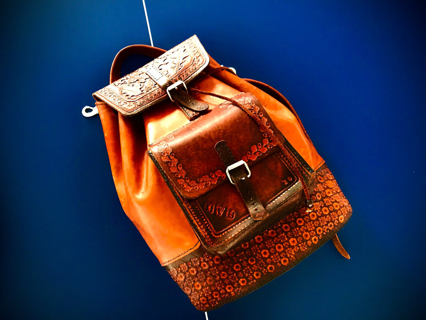 Hand embossed full leather backpack