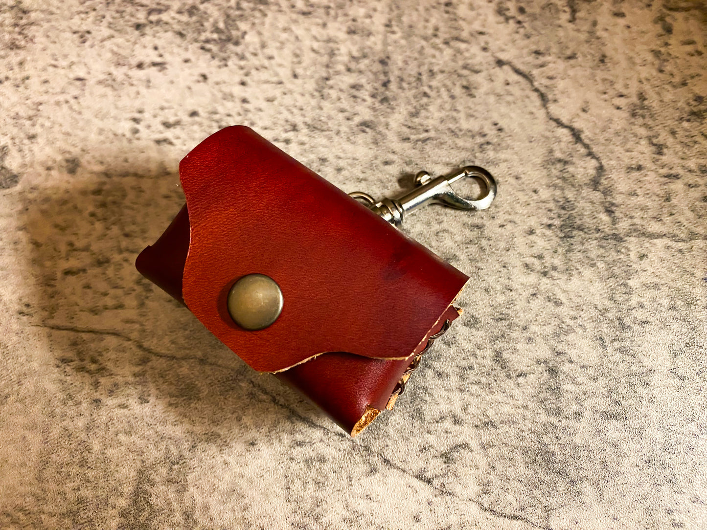 Hand dyed leather poo bag dispenser