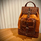 Hand embossed full leather backpack