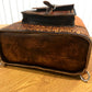 Hand embossed full leather backpack