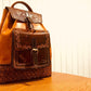 Hand embossed full leather backpack